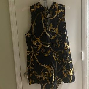 Black and gold short sleeve shirt never worn 3x great with a pair of tights
